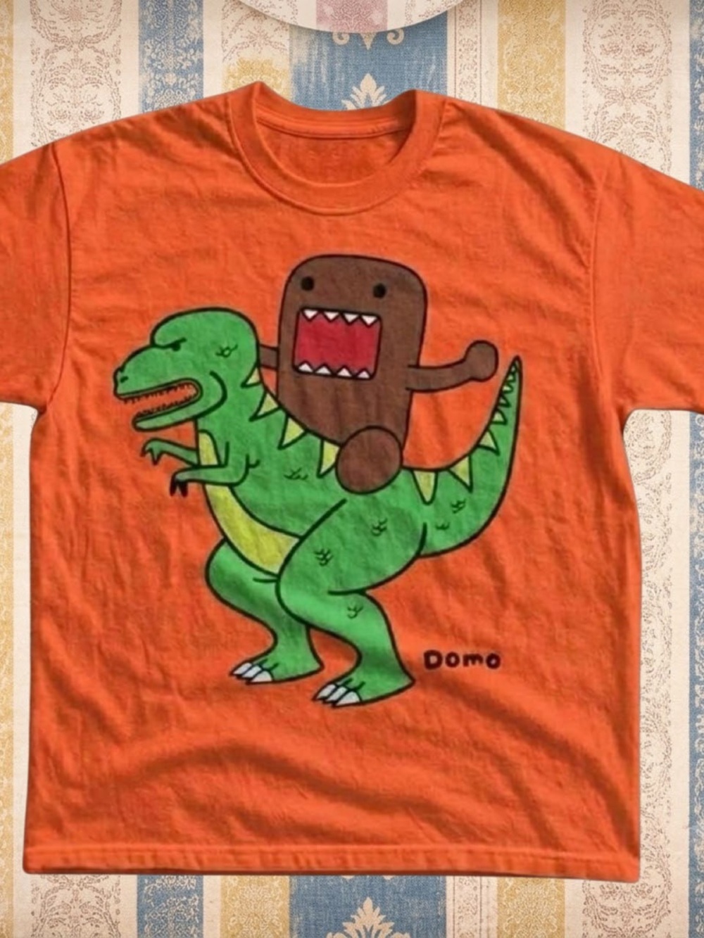 Gildan Orange Tee with Domo Riding Green Dinosaur Graphic